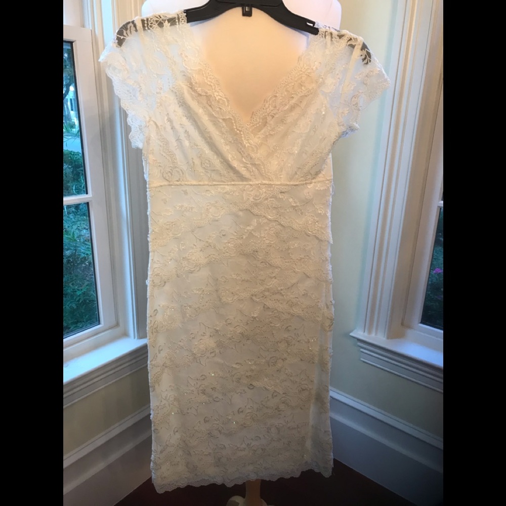 Marina Ivory Lace Body Con Dress with crystal bead embellishment.